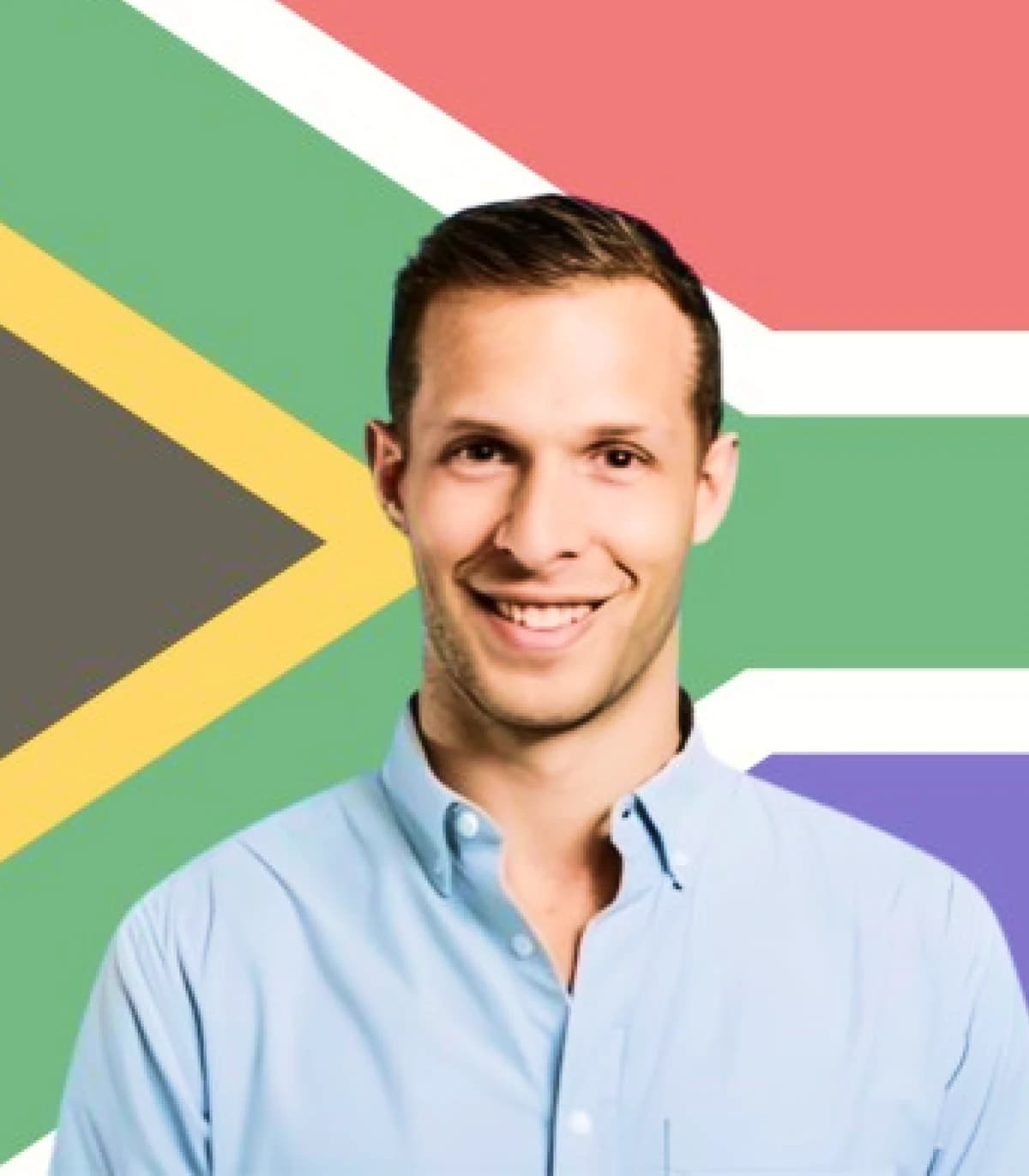 Dan, founder of Talently, in front of a South African flag